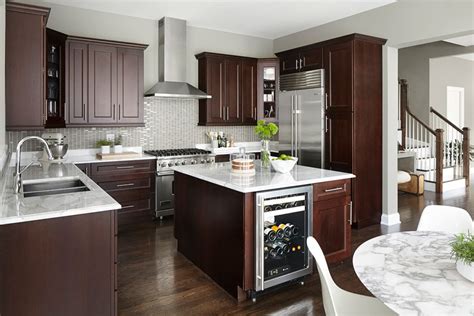 mahogany cabinets with white countertops